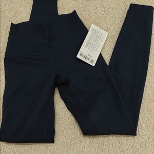 Wunder Under HR dark blue tight with tags